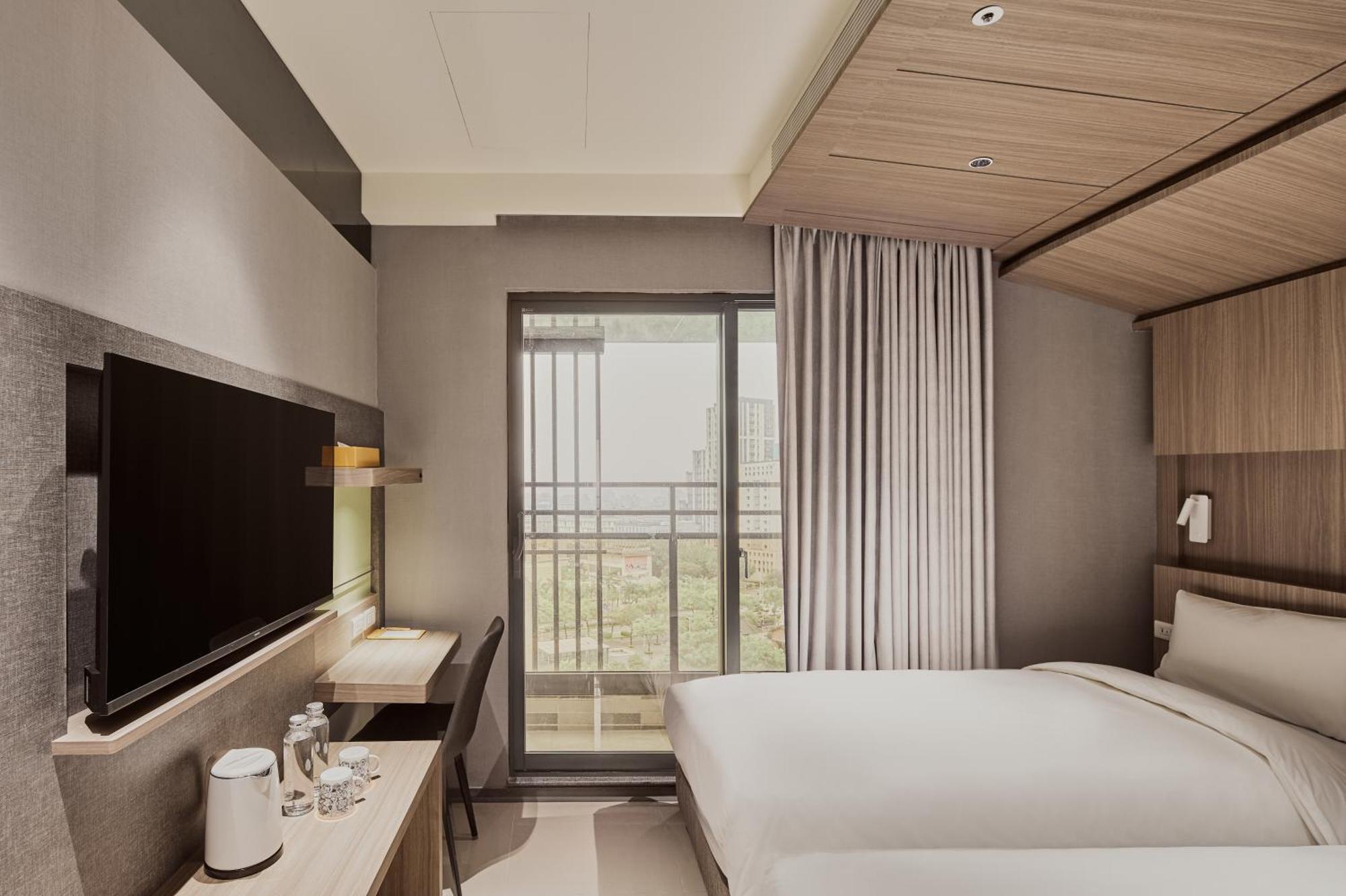 Orange Hotel -Hanzhong, Тайбэй Экстерьер фото